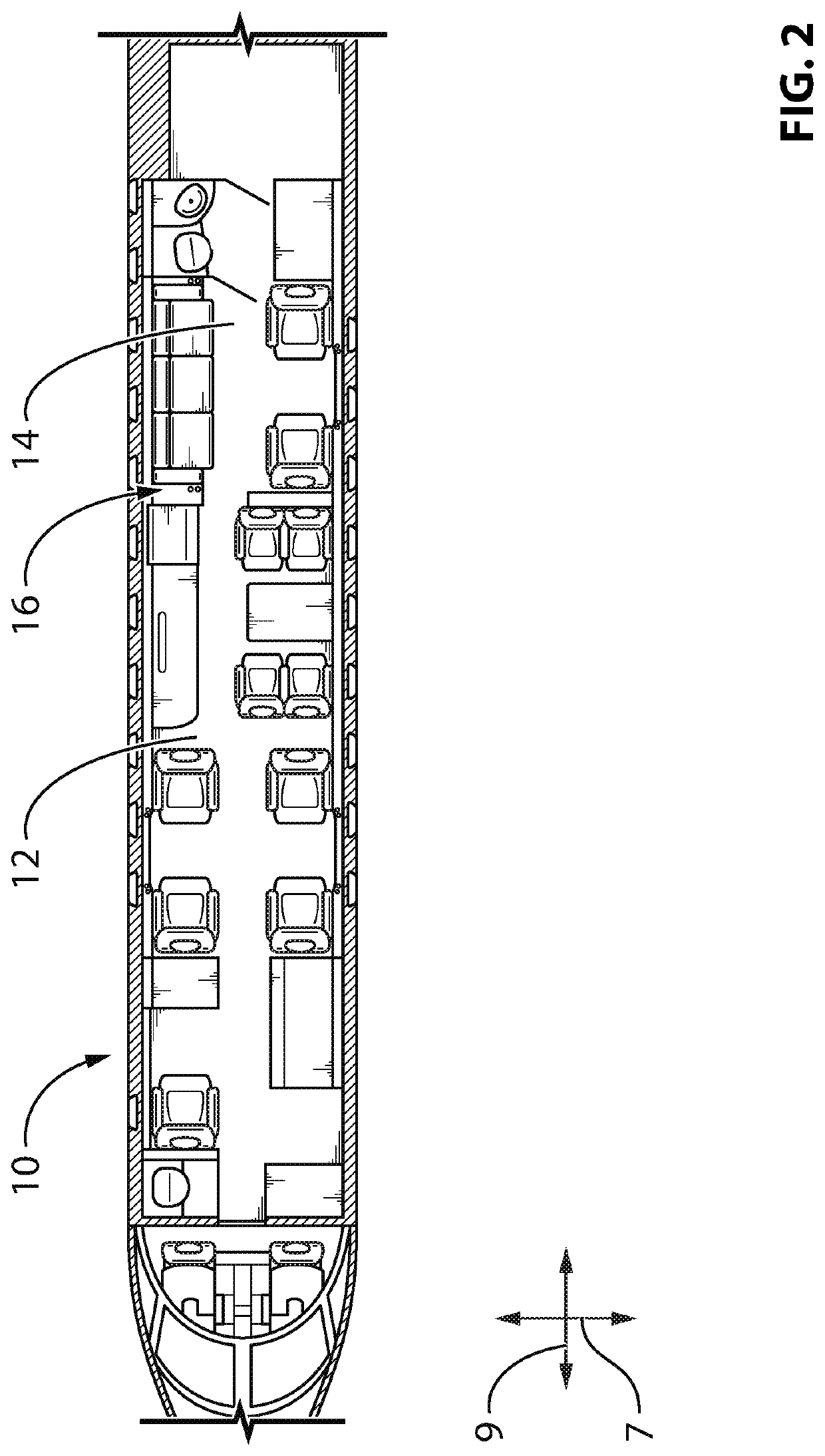 Aircraft cabin and partition assembly therefor