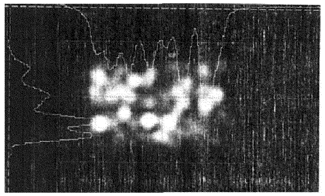 Long range barcode scanning through conversion of coherent light