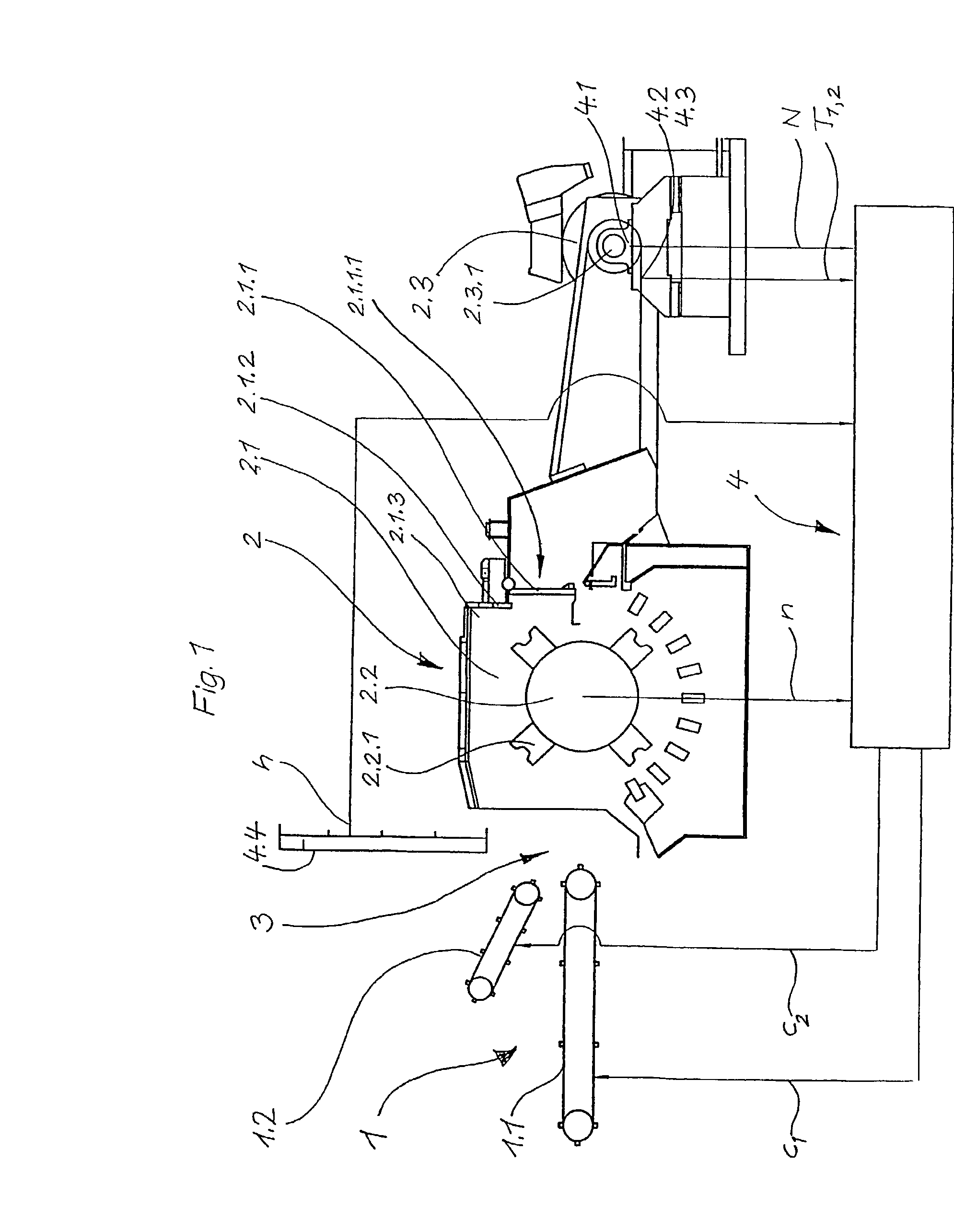 Method and installation for comminuting scrap material