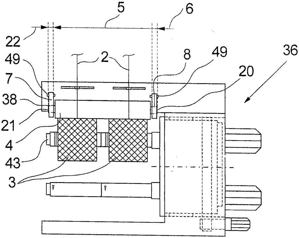 Device for pressing the yarn onto the bobbin