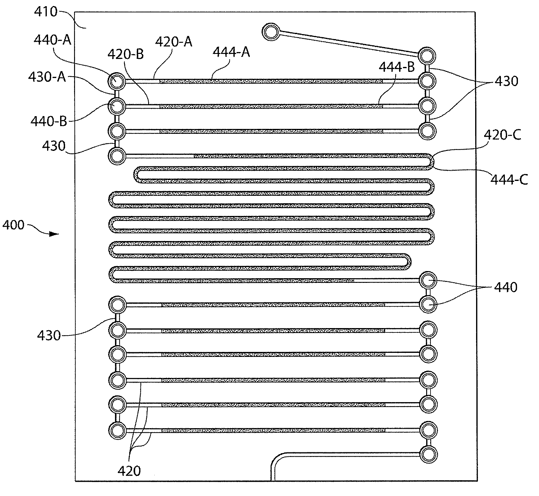 Reagent storage in microfluidic systems and related articles and methods