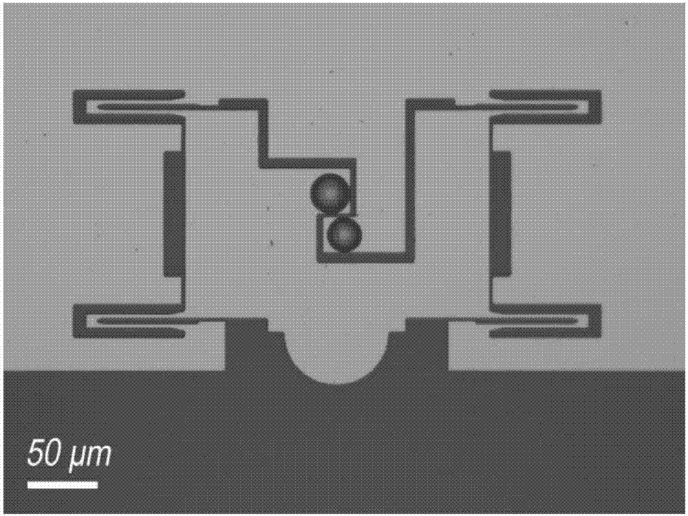 Transmission electron microscope in-situ nanomechanical tensile testing sample bonding method