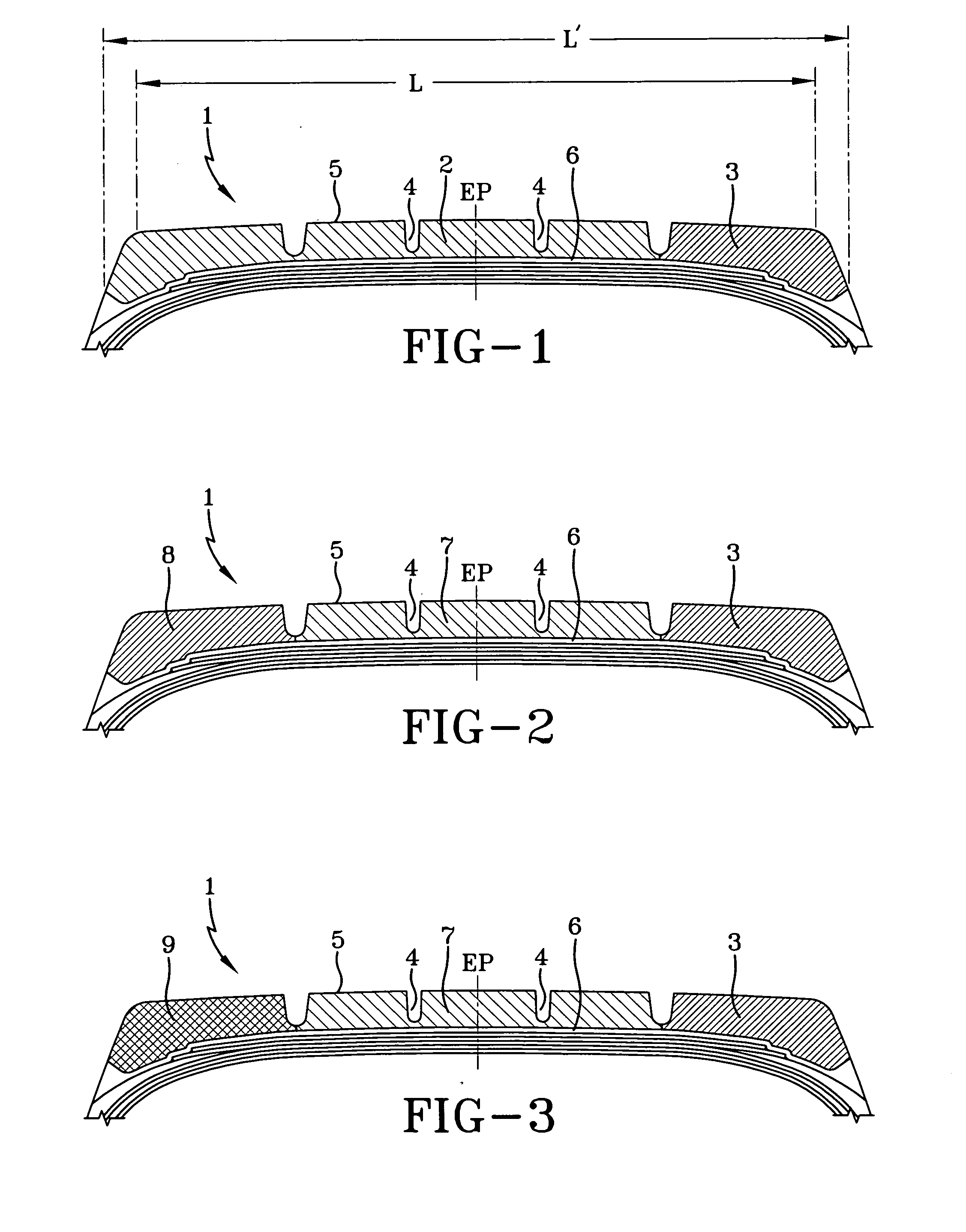 Tire with rubber tread composed of a primary and at least one lateral tread portion containing a dispersion of short carbon fibers