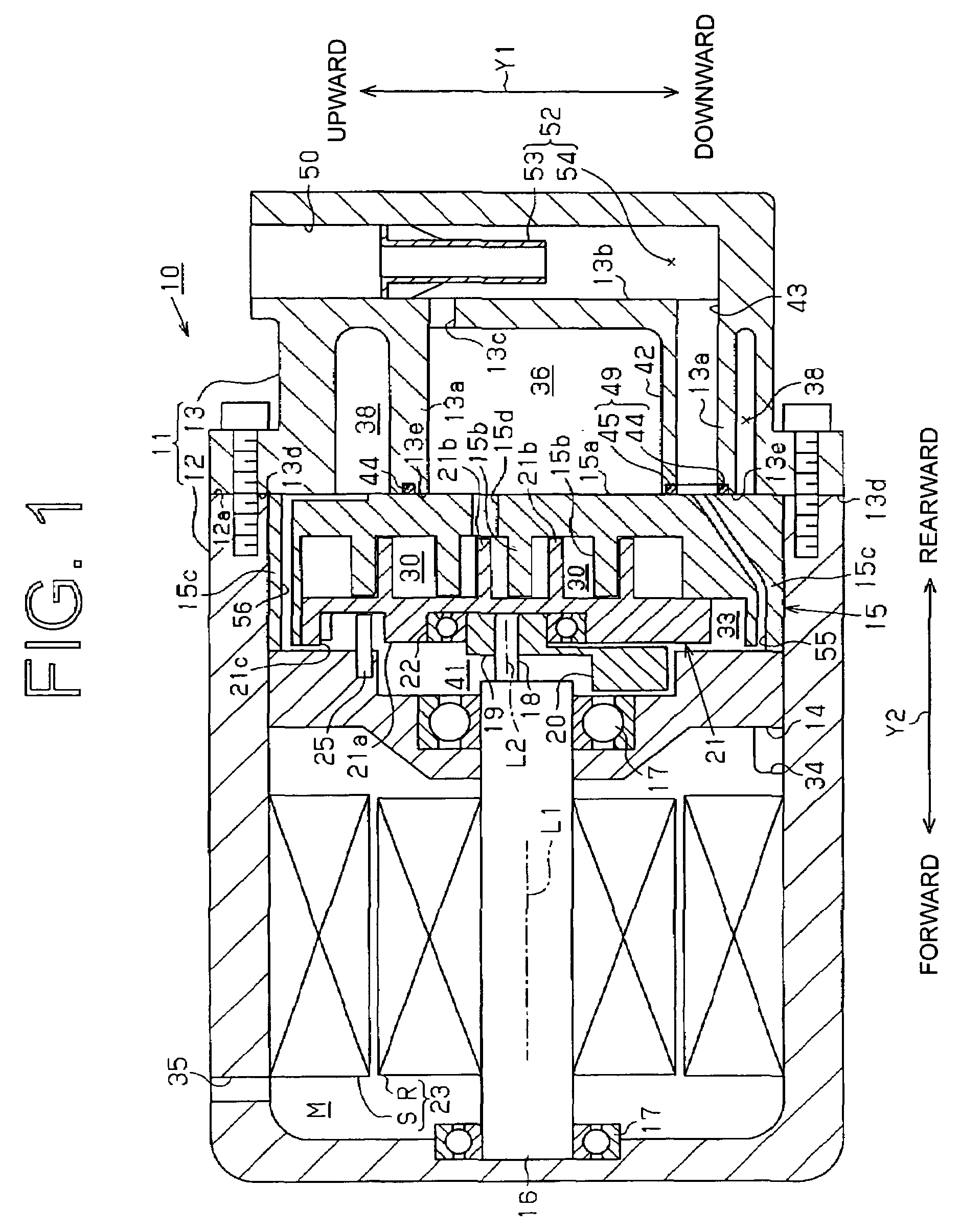 Scroll compressor having an oil reservoir surrounding the discharge chamber and an oil separator in the rear housing