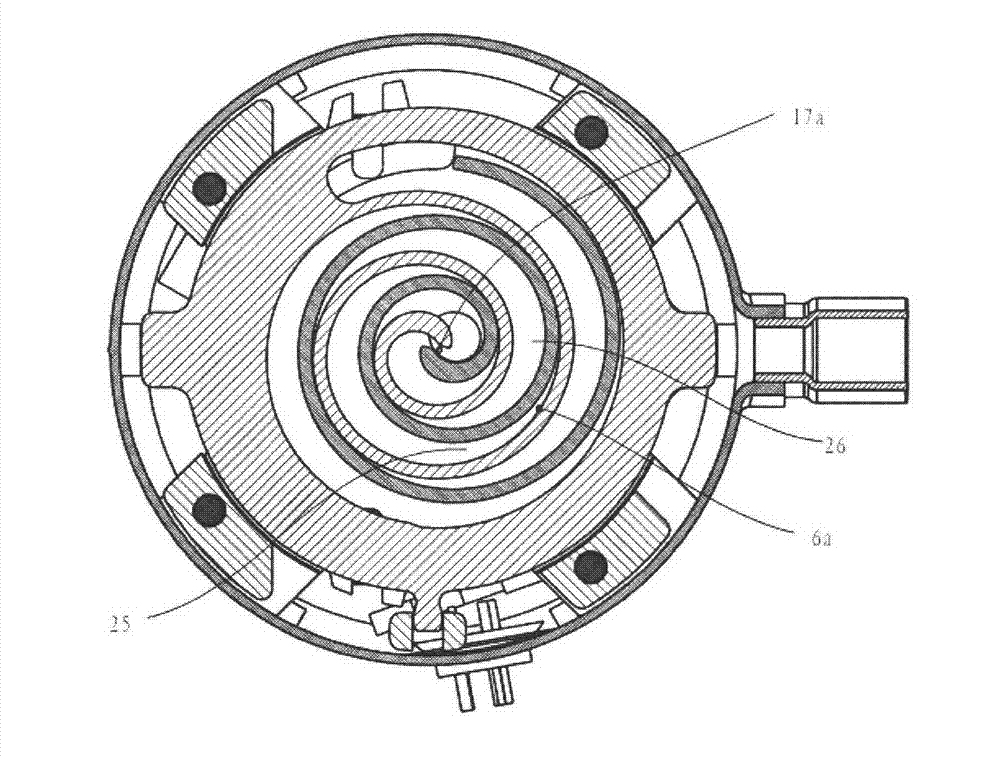 Scroll compressor with axially flexible seal