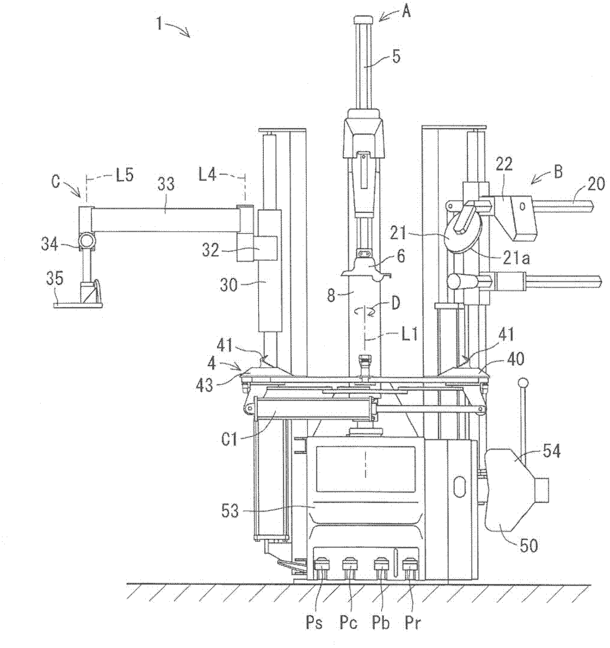 Tire mounting and demounting machine, tire mounting method and tire demounting method