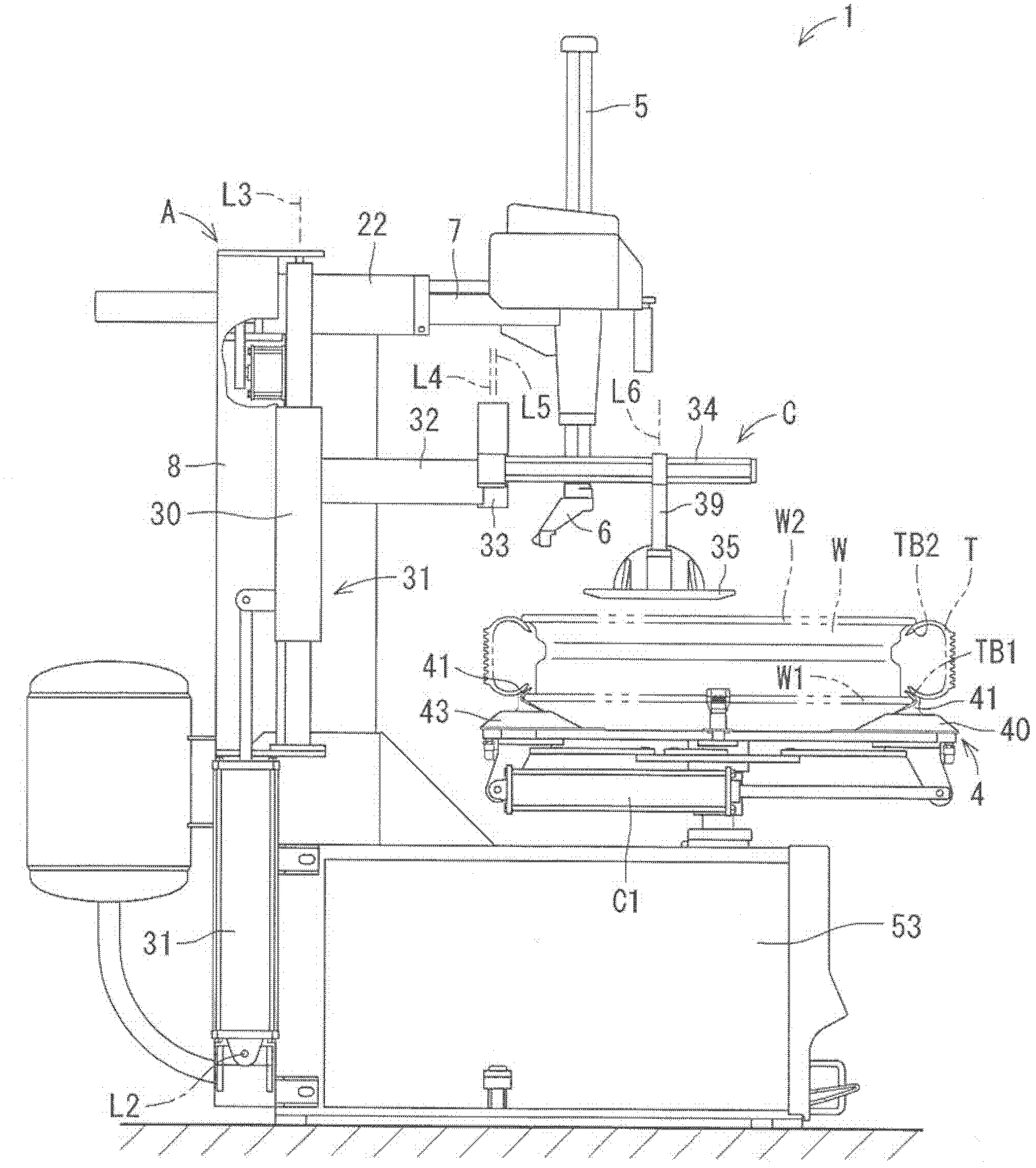 Tire mounting and demounting machine, tire mounting method and tire demounting method
