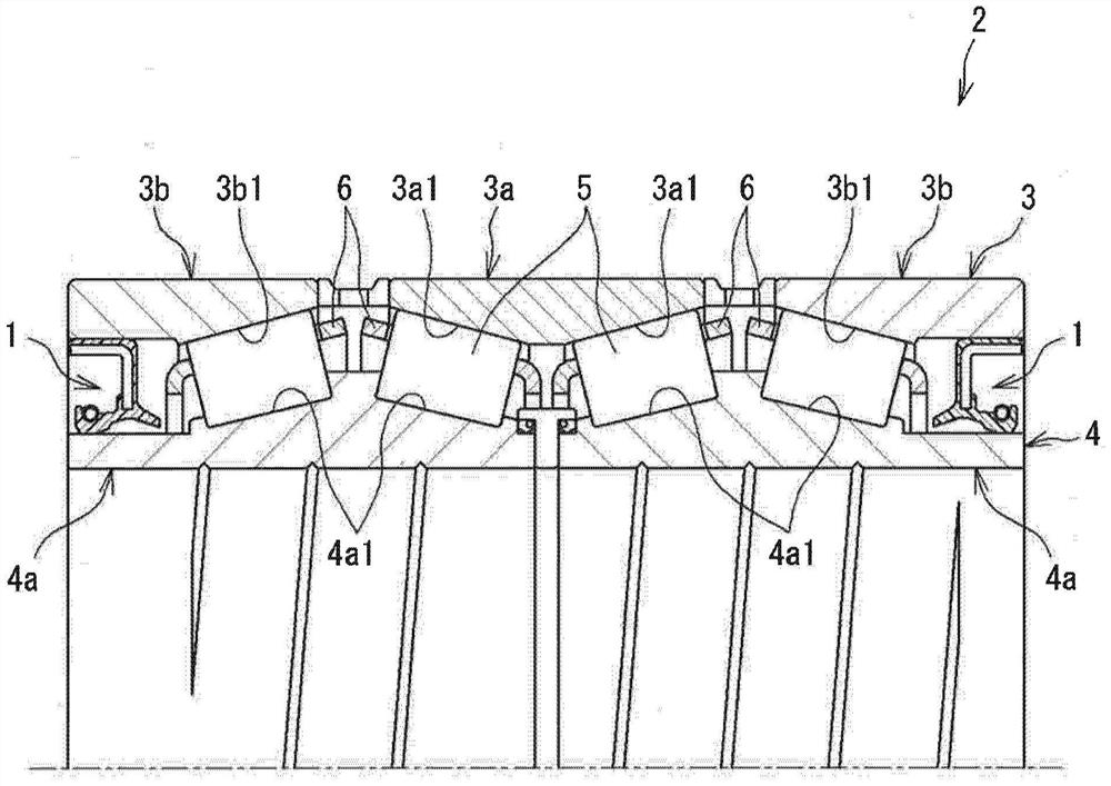 Sealing device and bearing device provided with the same