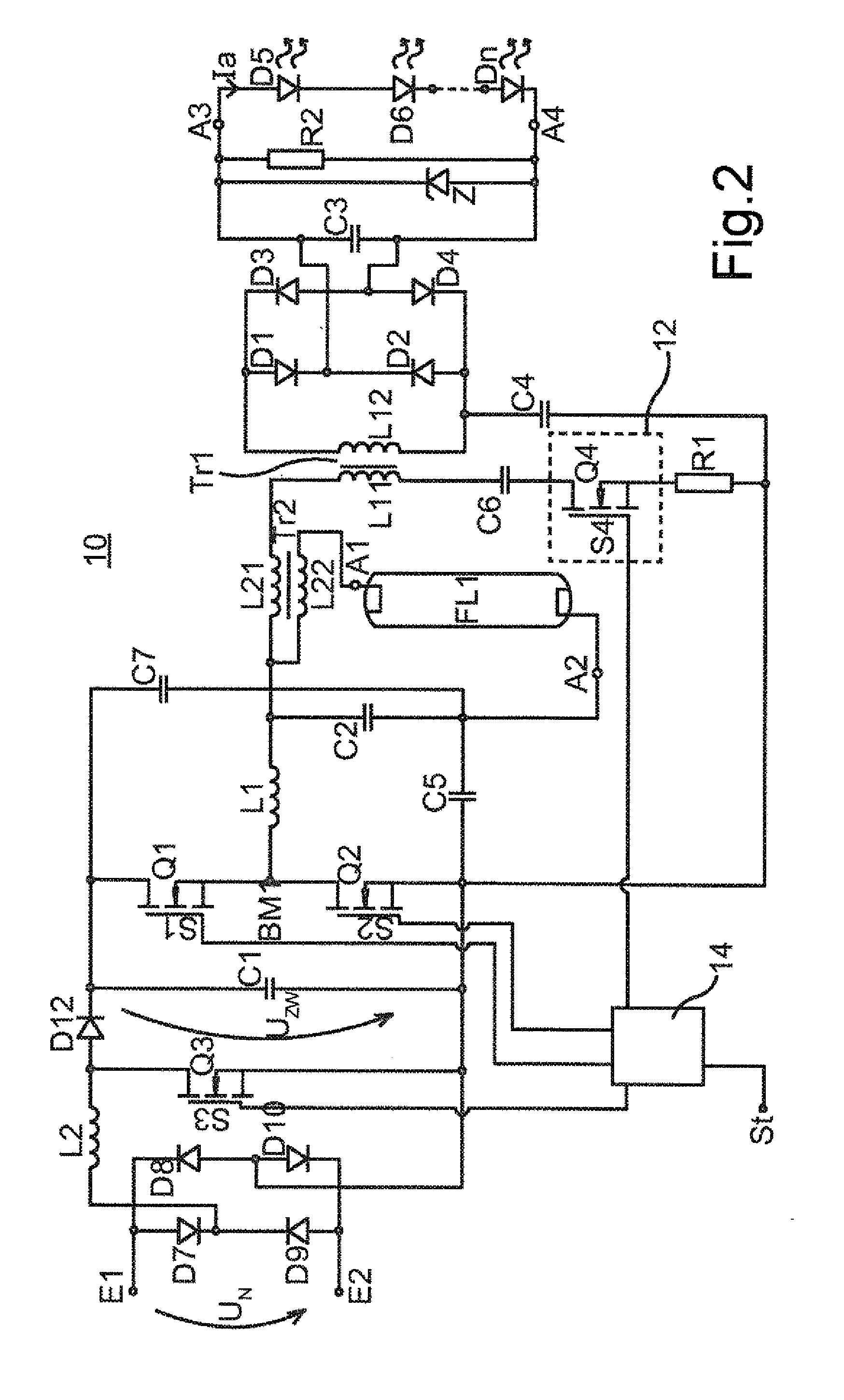 Circuit arrangement for operating at least one discharge lamp and at least one LED