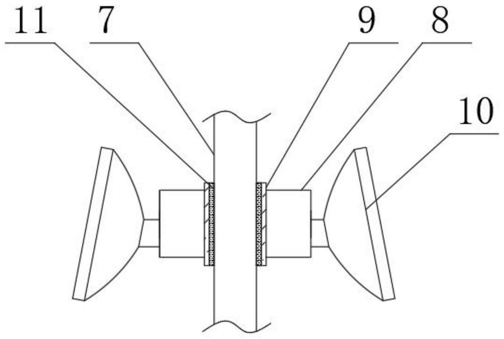 Raw material grinding device for spray coating processing