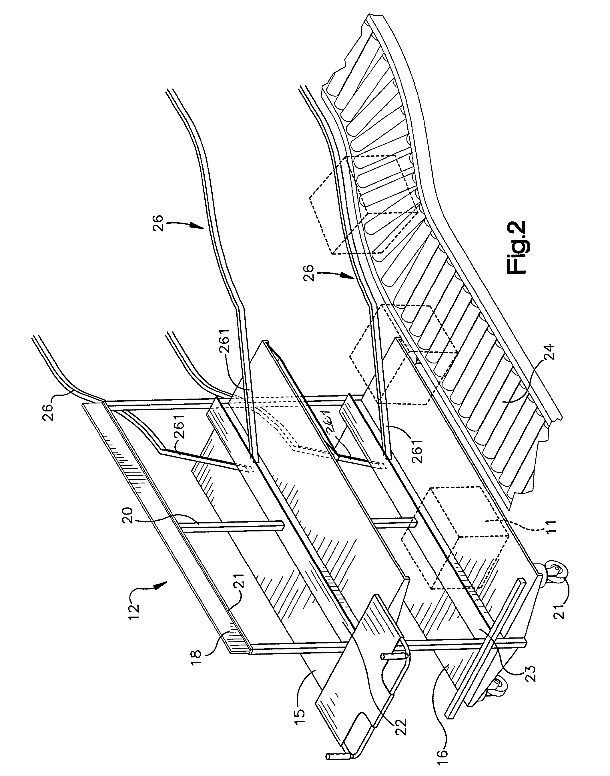Automated cart unloading/conveyor system