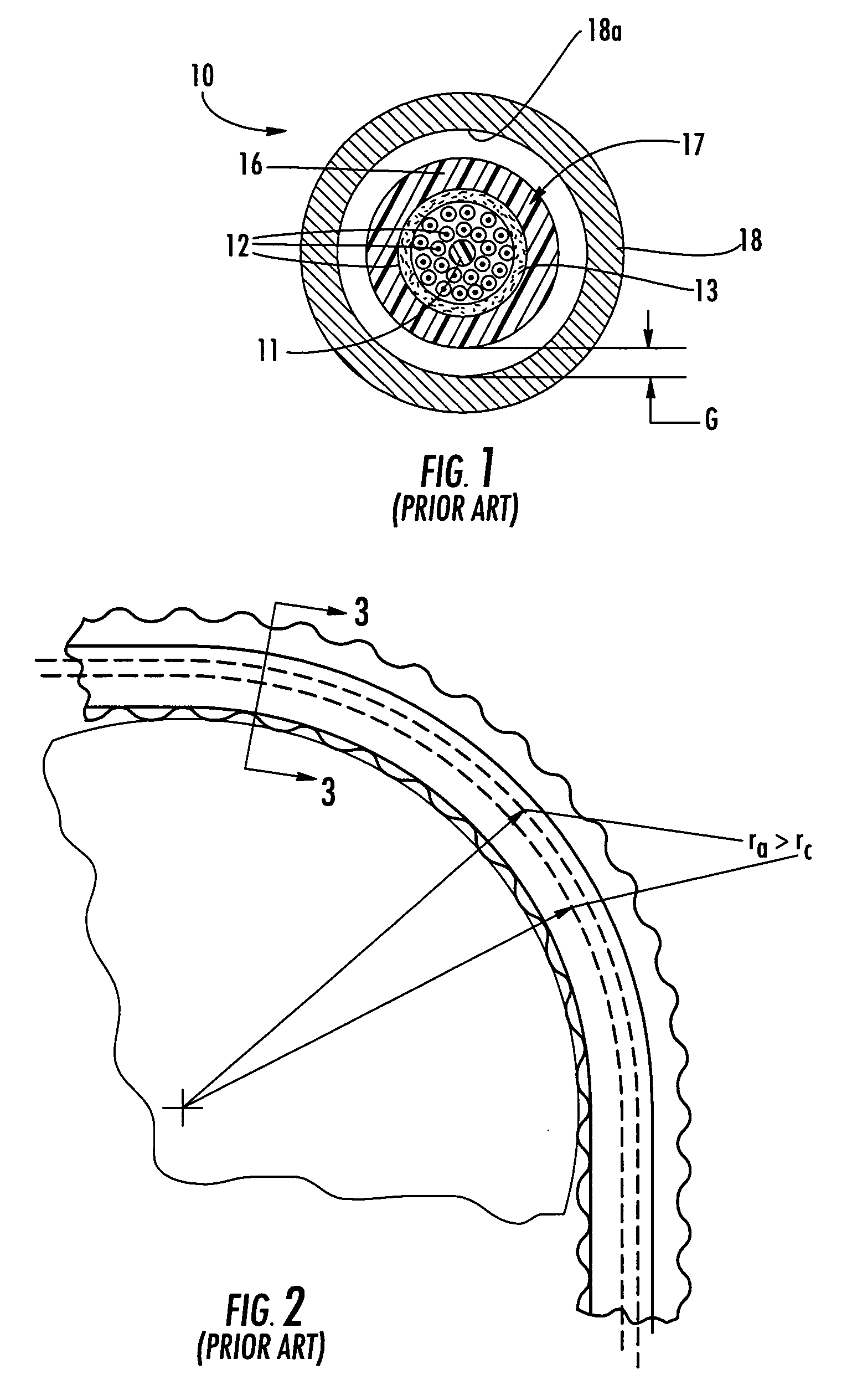 Armored fiber optic cable having a centering element and methods of making