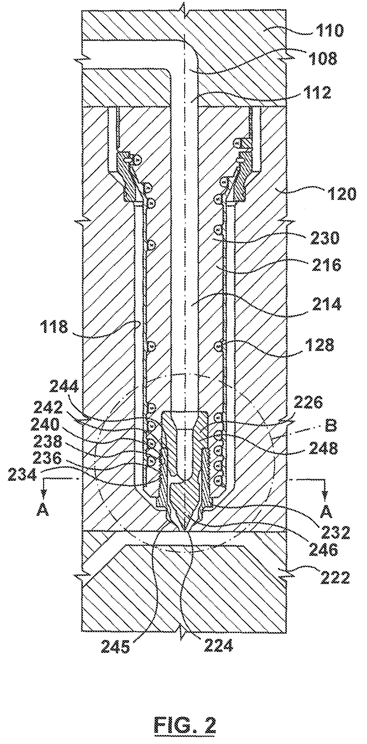 Injection molding nozzle having an annular flow tip