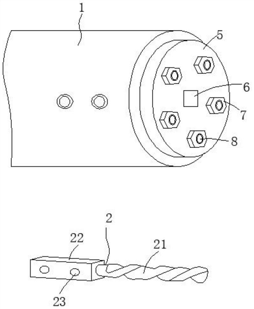 A drill bit self-grinding fixing device for drilling the front axle of automobiles