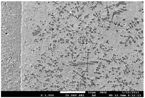 Laser reactive cladding TiC ceramic reinforced iron matrix composite material and preparation method thereof