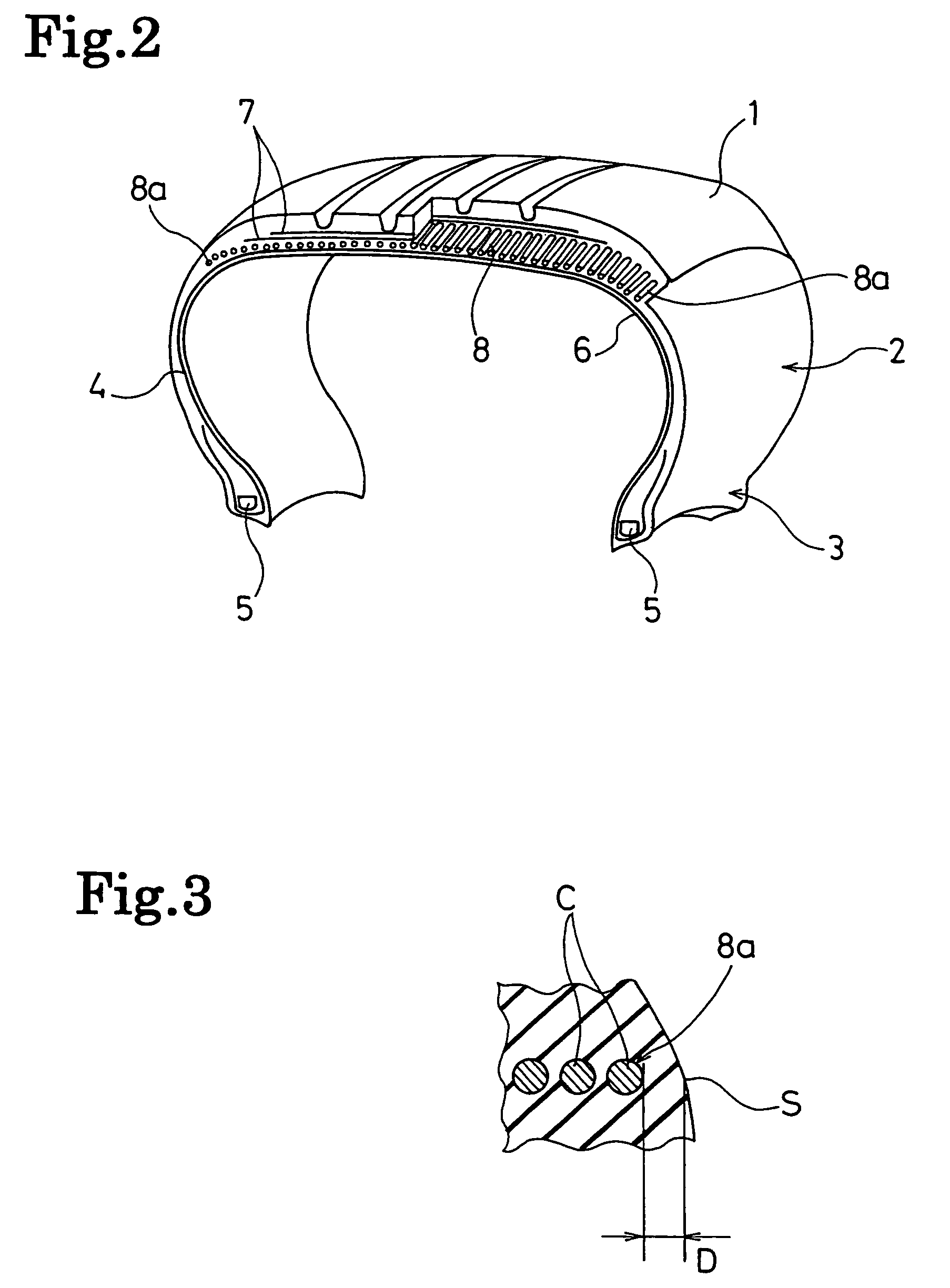 Pneumatic tire with wound cord layer between carcass layer and belt layers