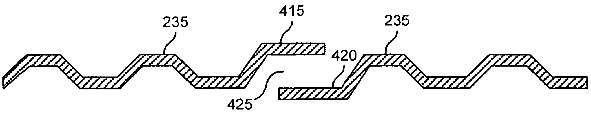 Tolerance ring for data storage with overlapping tab feature for mass control
