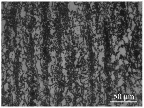 A high-strength, excellent low-temperature toughness marine steel and its multi-stage heat treatment process for a steel