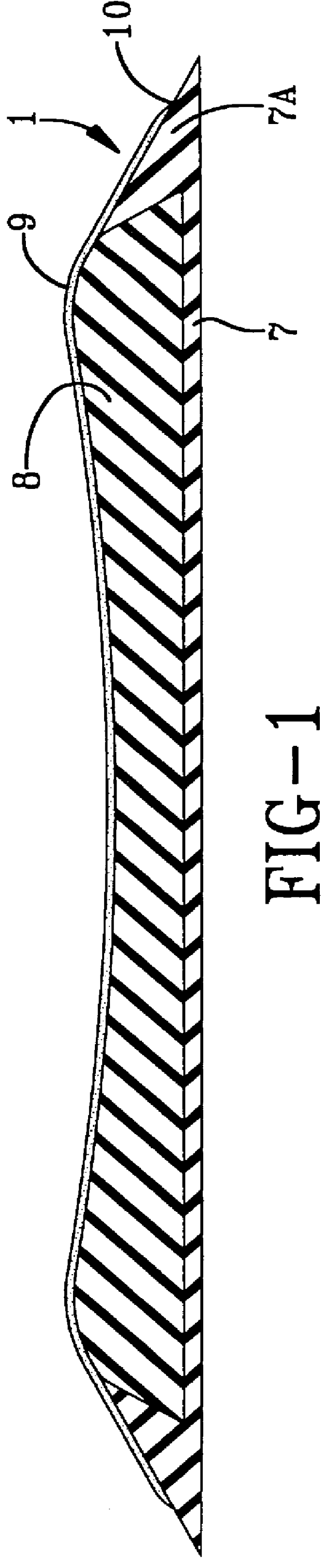 Tire having silica reinforced rubber tread with outer cap containing carbon black