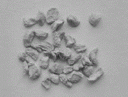 Granular cellulose filter aid applied to titaniferous solution filter in production of titanium oxide