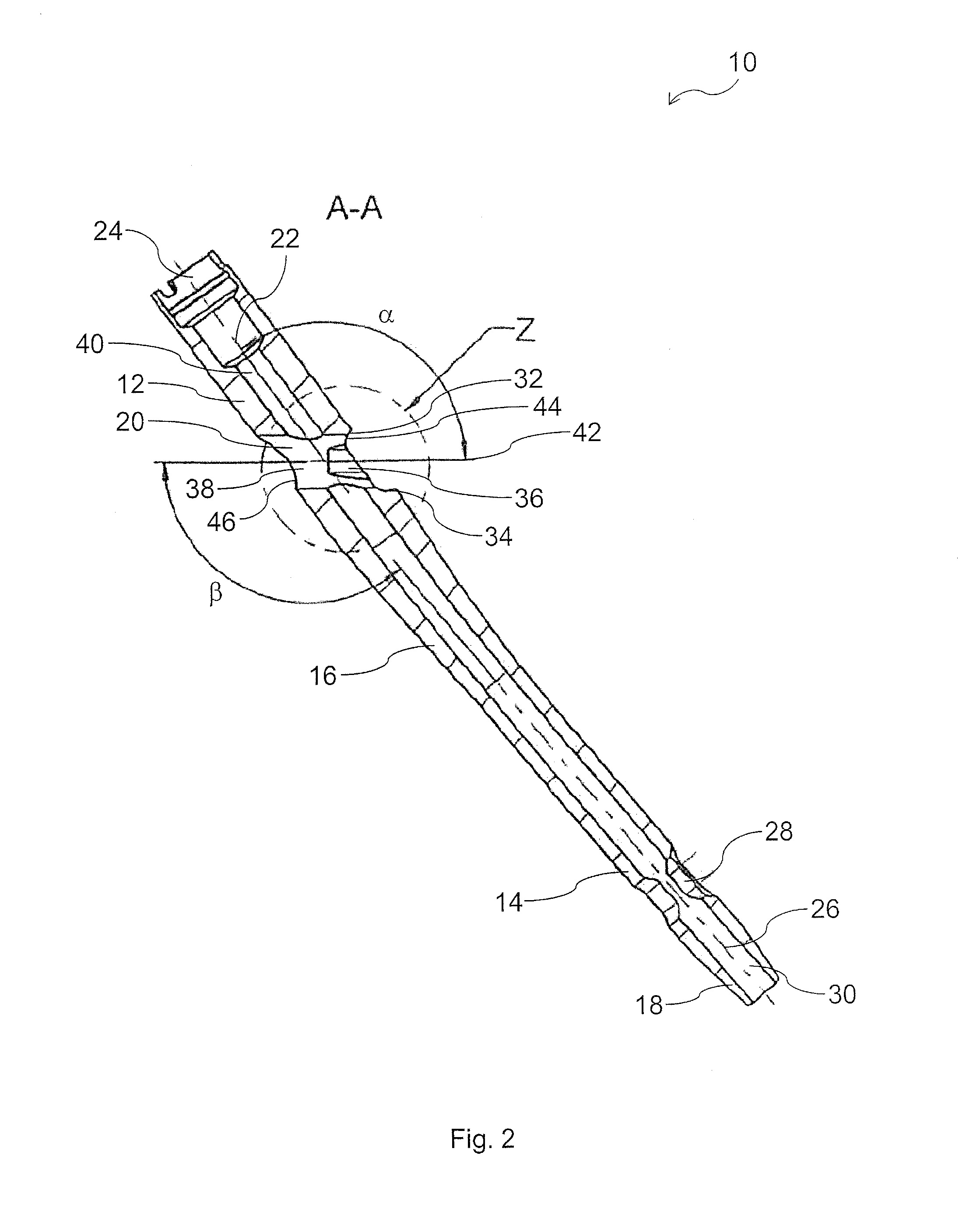 Intramedullary nail and implant system comprising the nail
