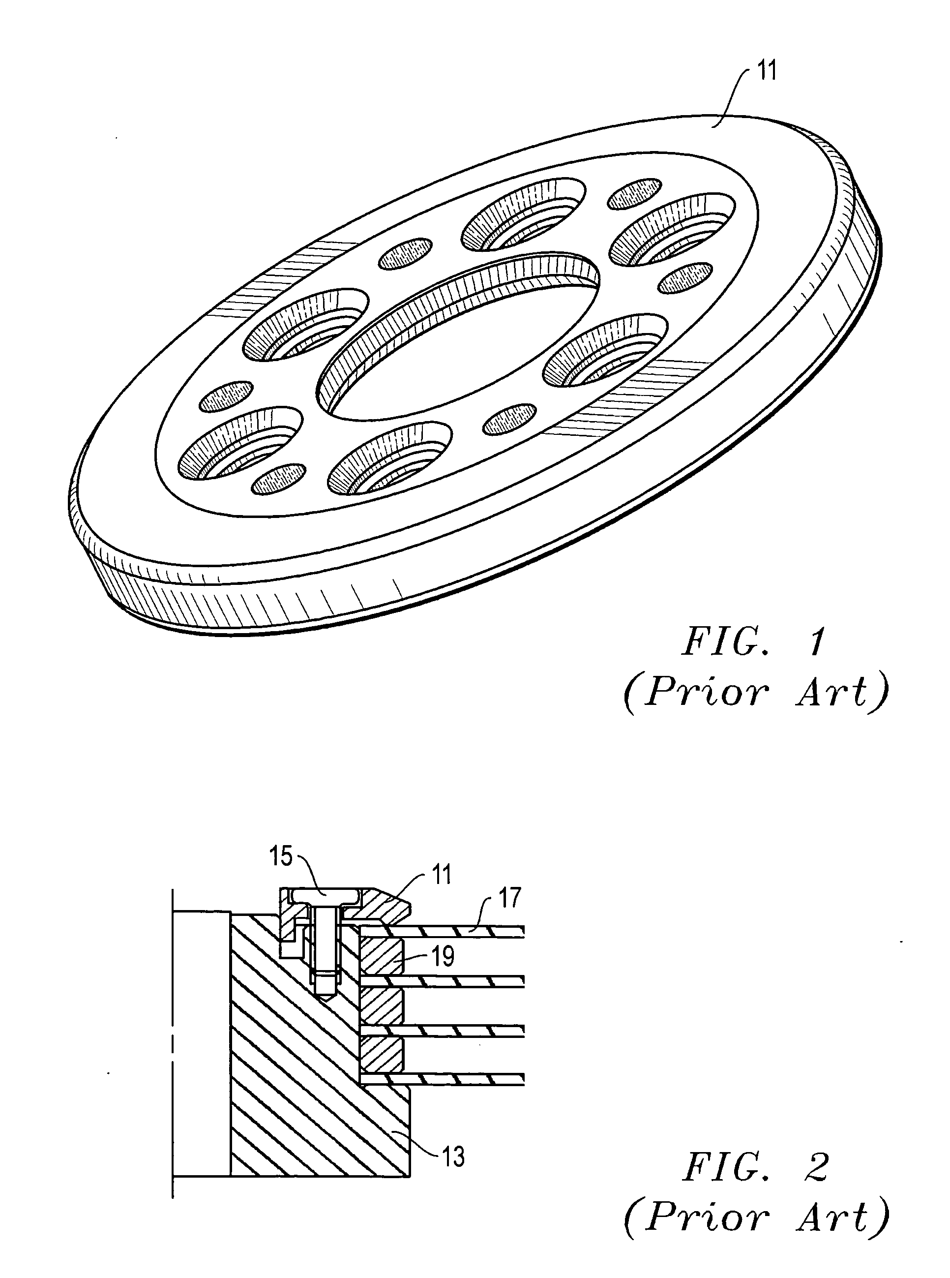 System, method, and apparatus for distributing stress with one or more cavities in a disk clamp for disk drive applications