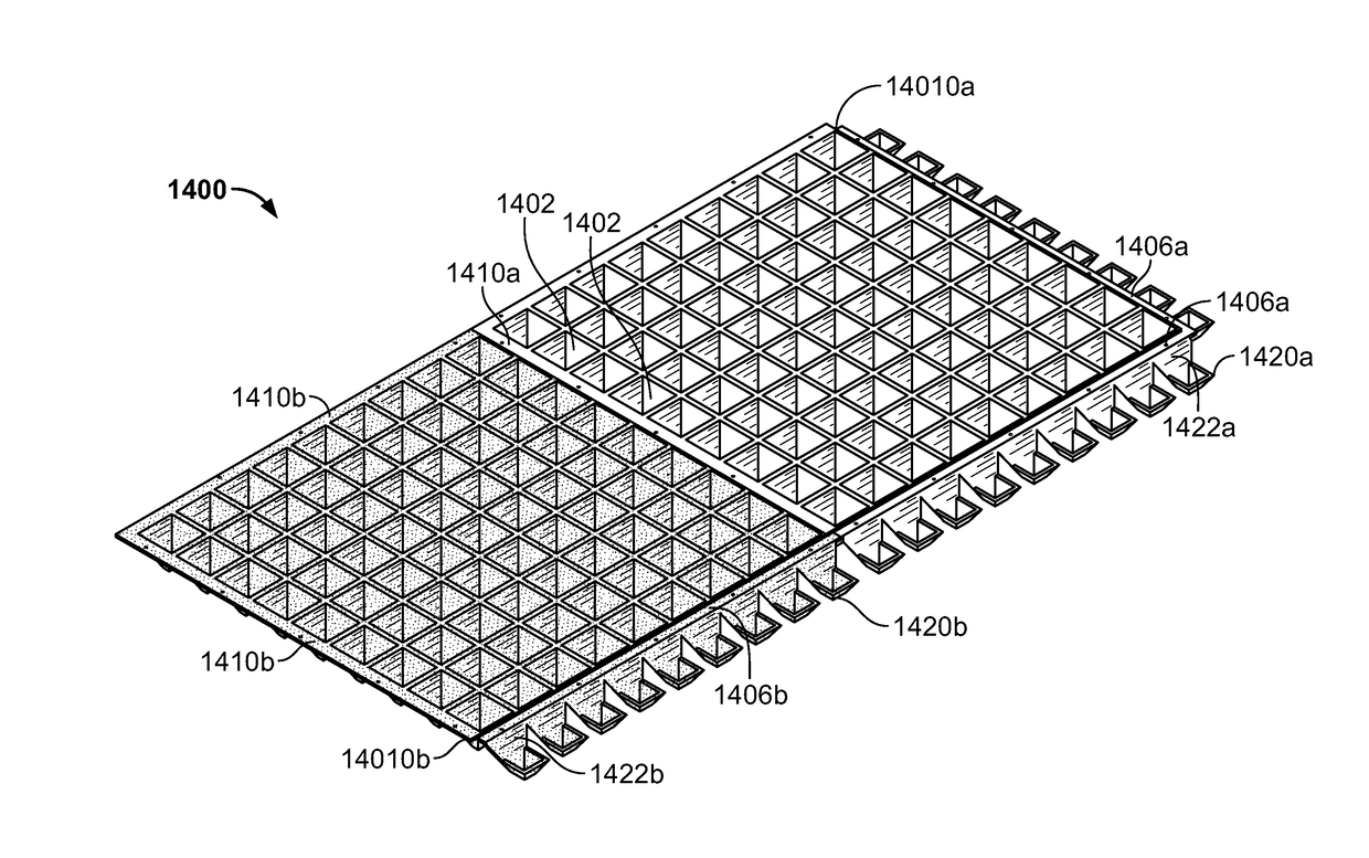 Safety surface with engineered shock-absorbing base