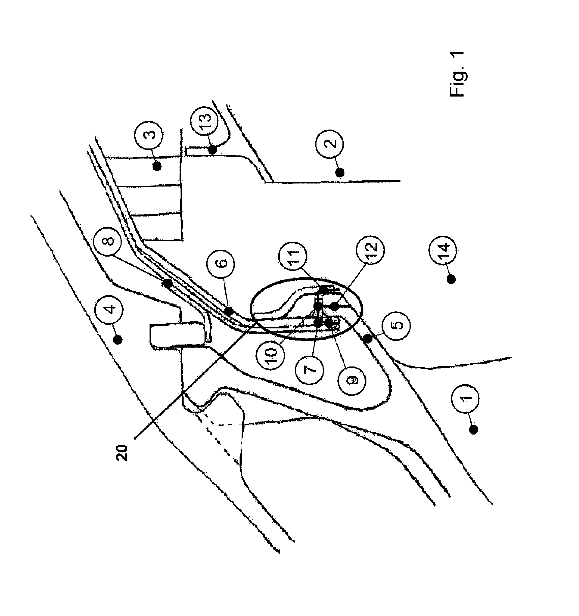 Seal carrier attachment for a turbomachine
