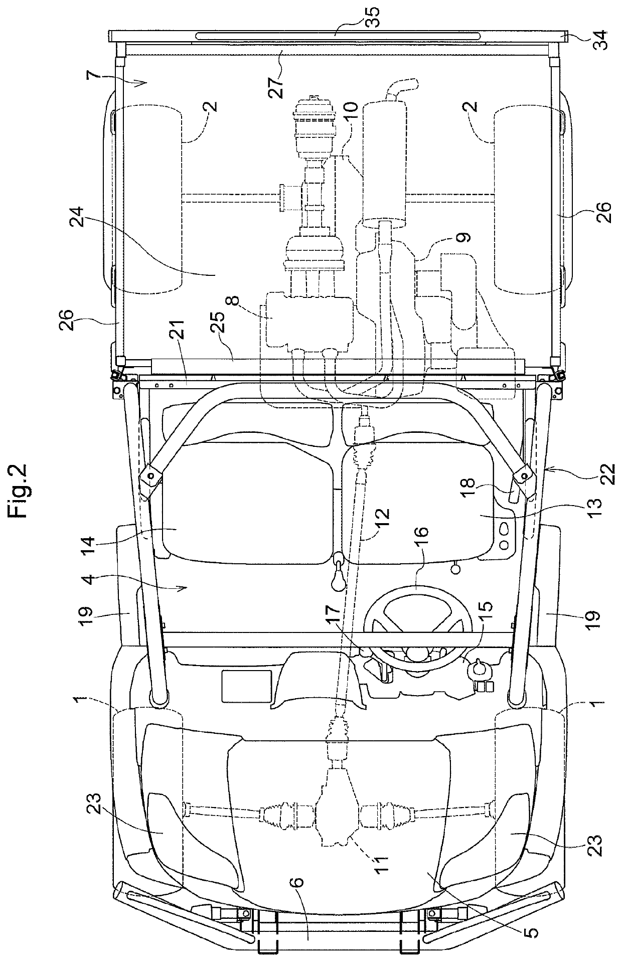 Vehicle having a load carrying deck and attachment device for the same