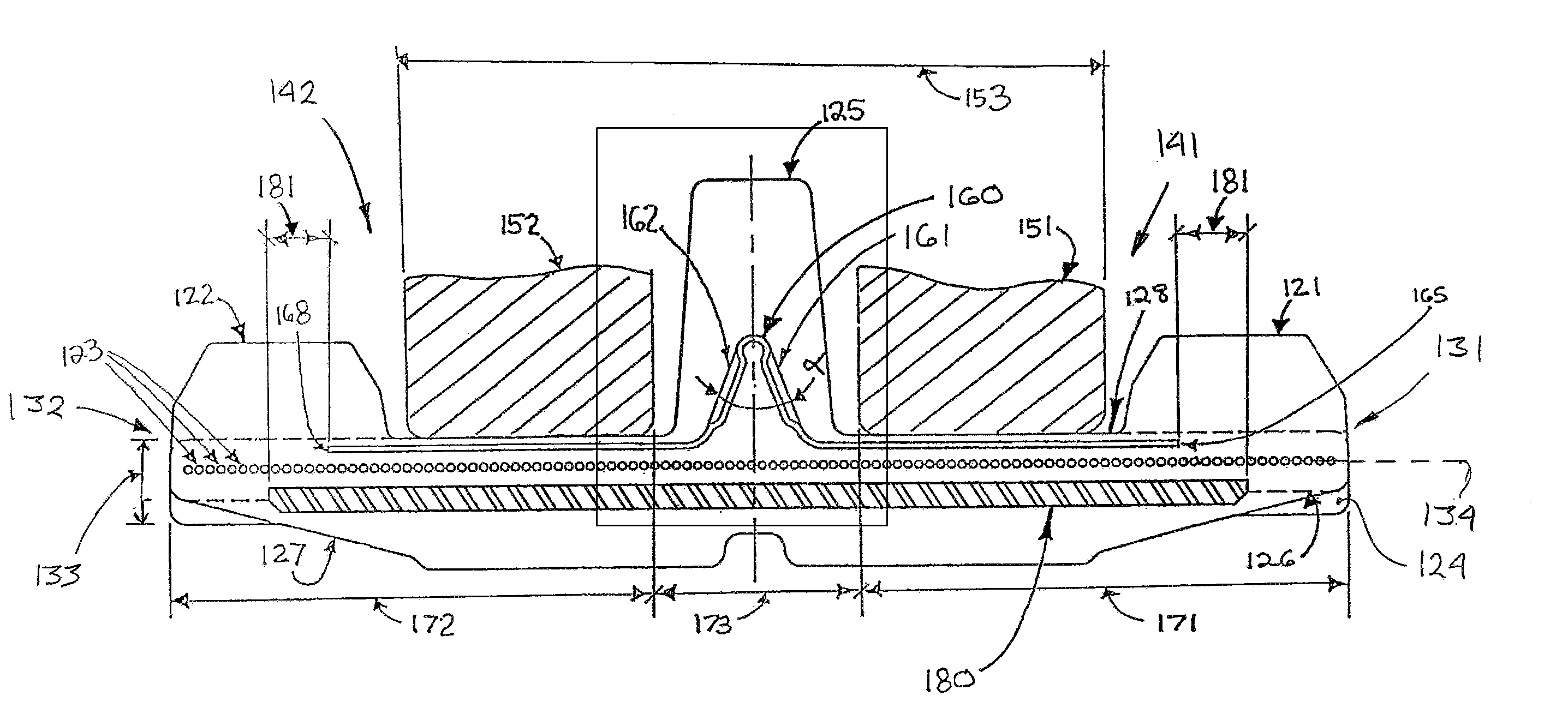 Elastomeric track with guide lug reinforcements