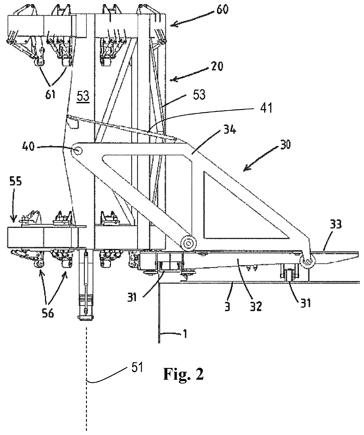 A pile upending and holding system and method