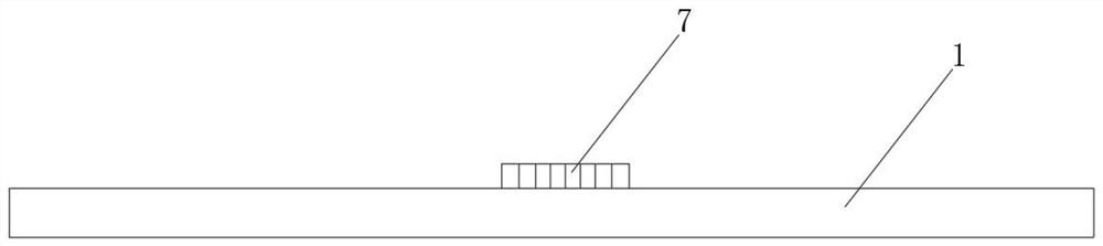 A clamping mechanism of a CNC machining center and a method of using the same