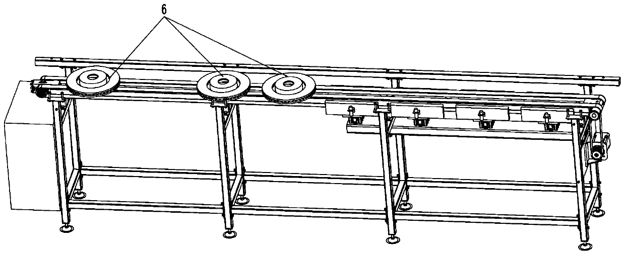 Workpiece arrangement conveying device