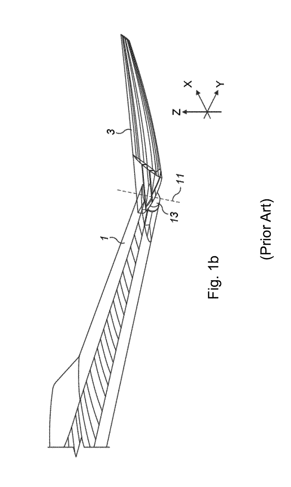 Arrangement of ribs at an interface between an outer end of a wing and a moveable wing tip device