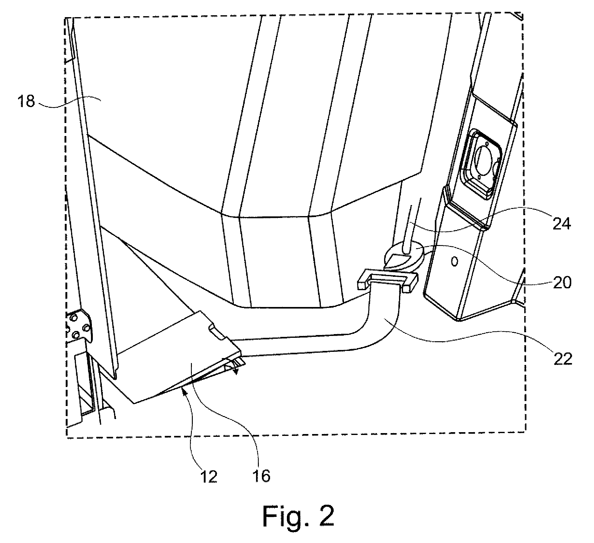 Assembly and method for stowing away and removing a survival kit in a passenger cabin of an aircraft