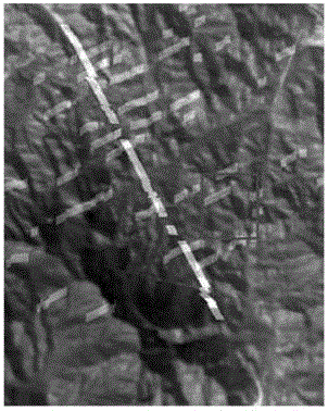 Detection method based on ridge energy correction for ribbon underground target in mountain land