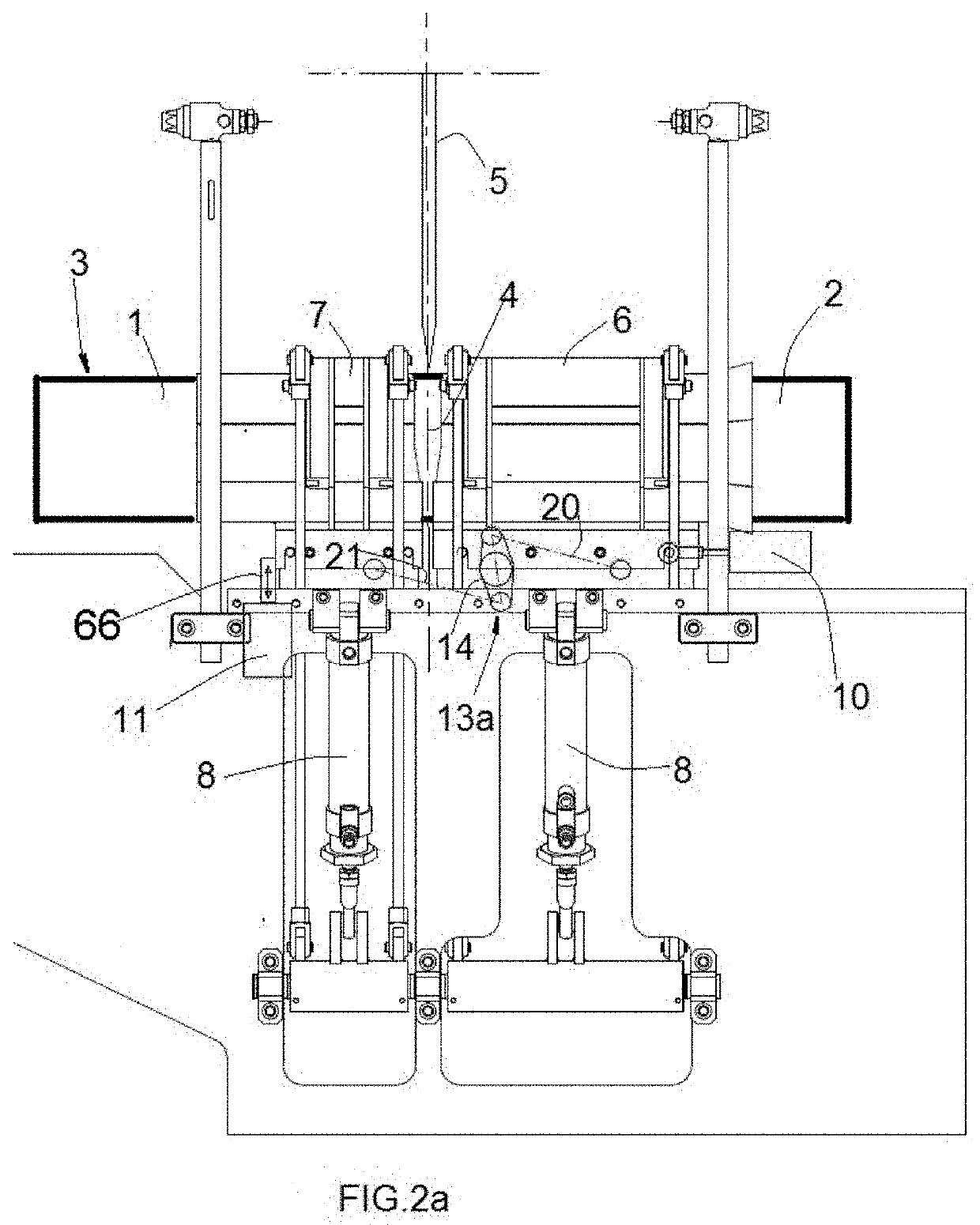 Device for clamping a roll of paper in a cutting machine
