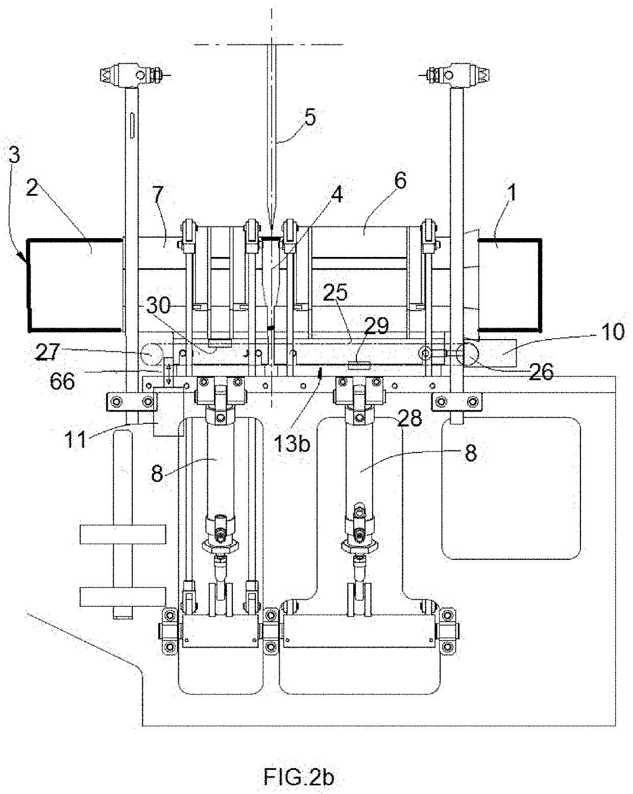 Device for clamping a roll of paper in a cutting machine