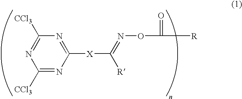 Photosensitive composition comprising triazine-based photoactive compound containing oxime ester