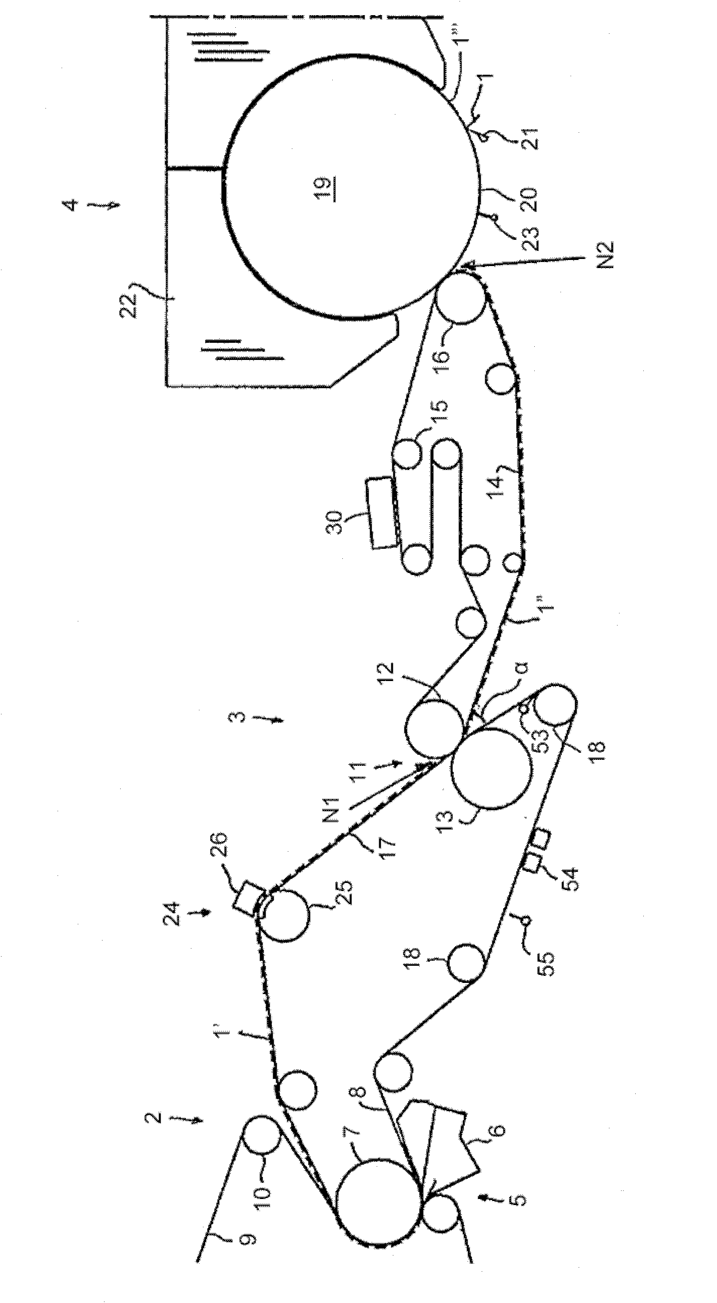 A tissue papermaking machine and a method of manufacturing a tissue paper web