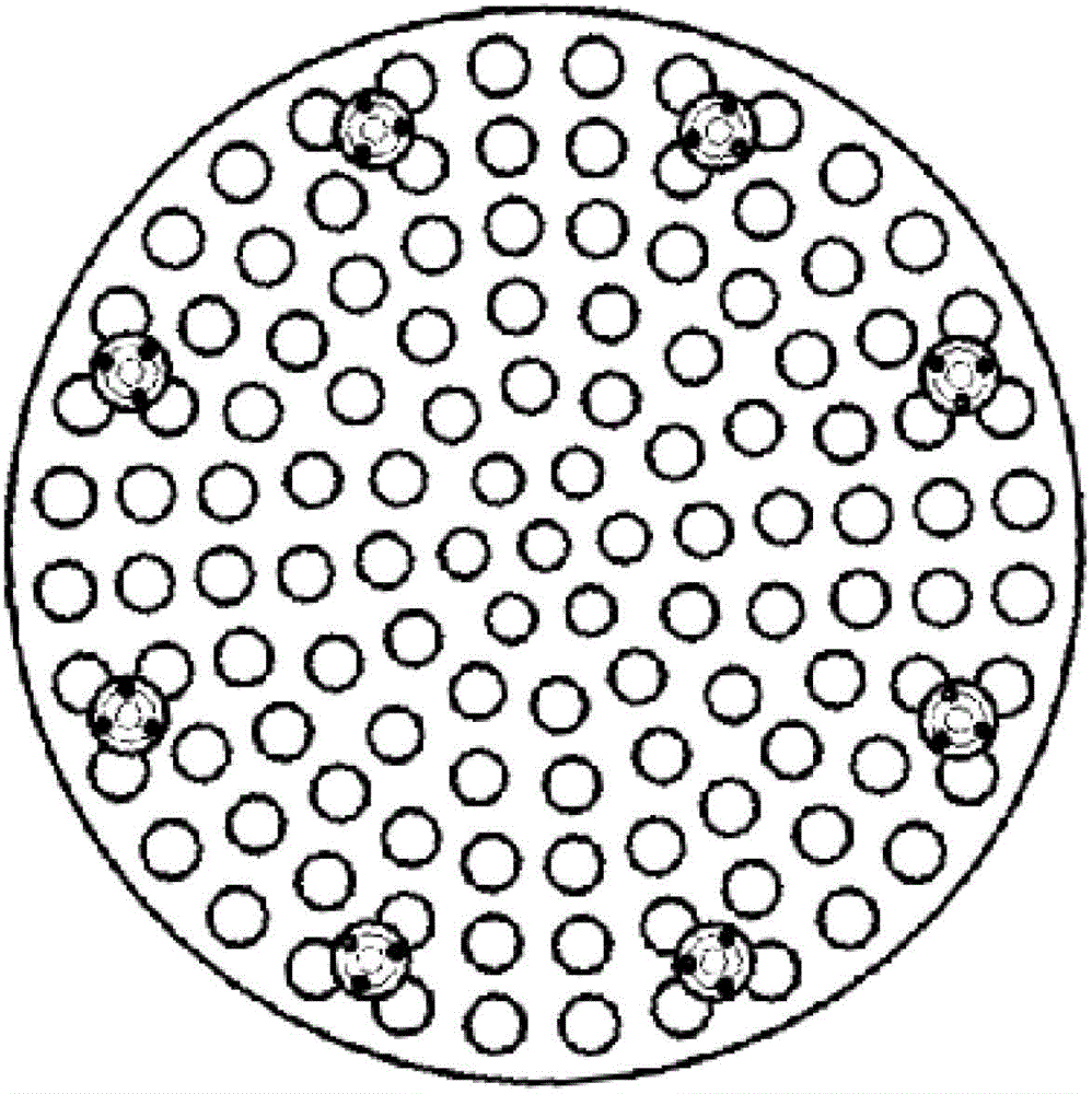 A plate-shaped flow distribution device for the lower chamber of a nuclear reactor