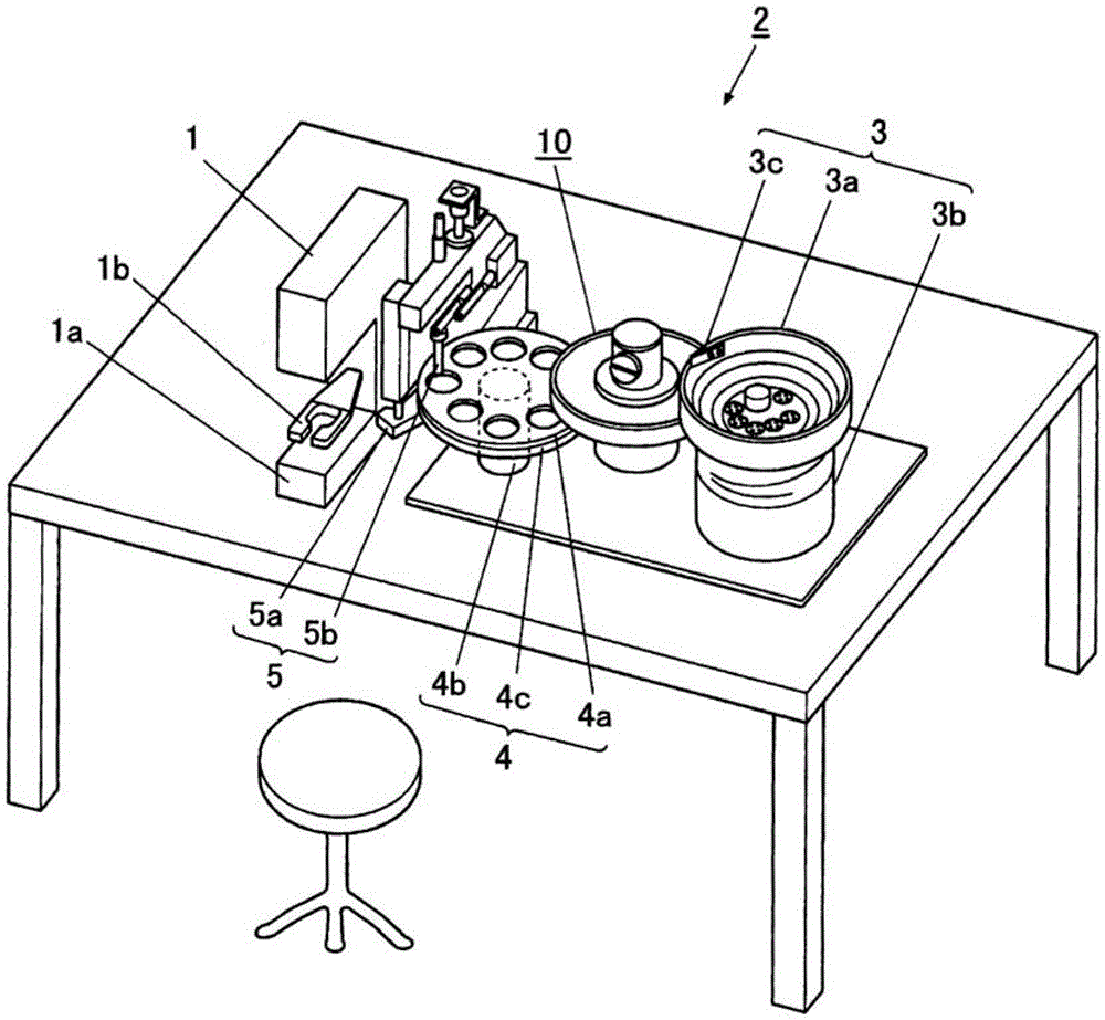 Button feeding device for sewing machine