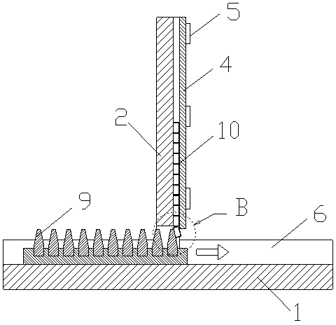 Automatic arranging and falling device for metal framework of valve oil seal