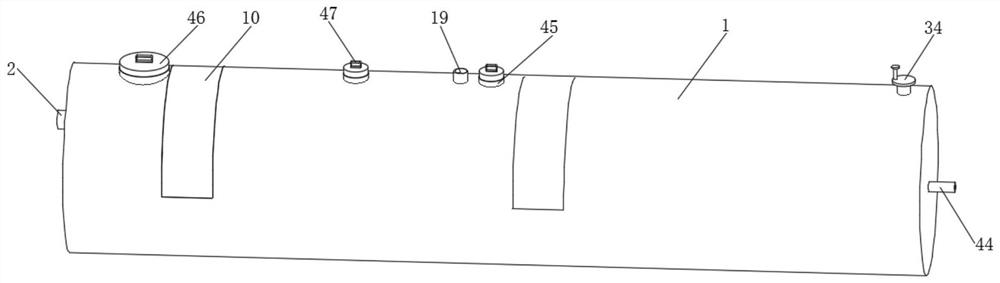 Unpowered anaerobic tank and constructed wetland biodegradation system