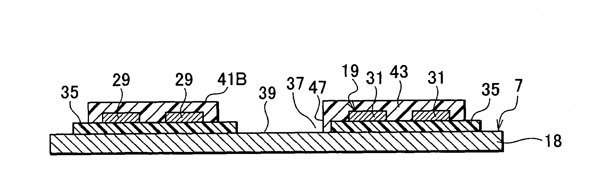 Head suspension having wiring disposed in contact with slightly conductive flexible resin