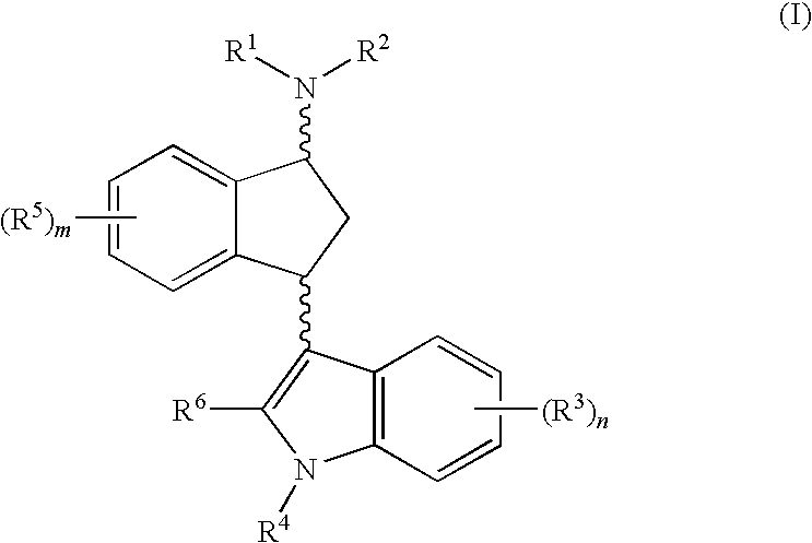 Indane compounds