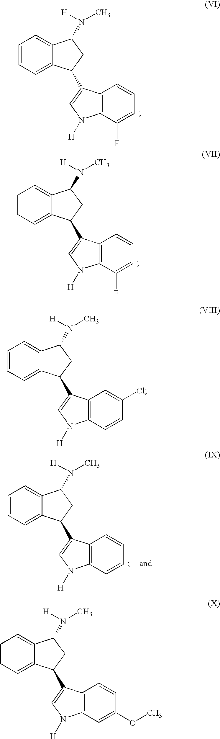 Indane compounds