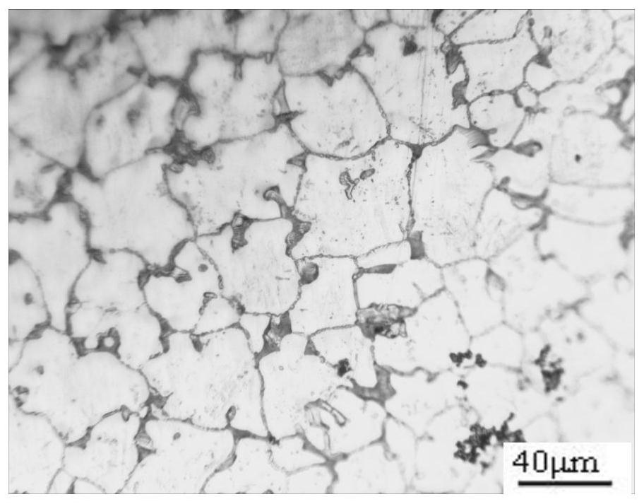 High-strength wrought aluminum alloy and production method thereof