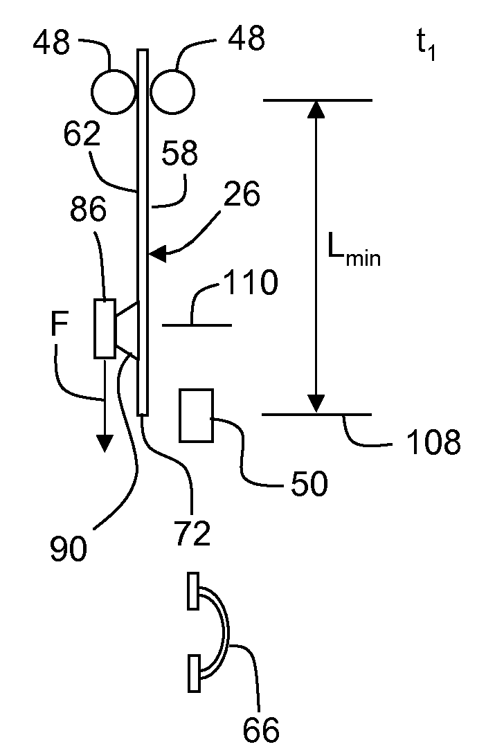 Apparatus and method for separating a glass sheet from a moving ribbon of glass