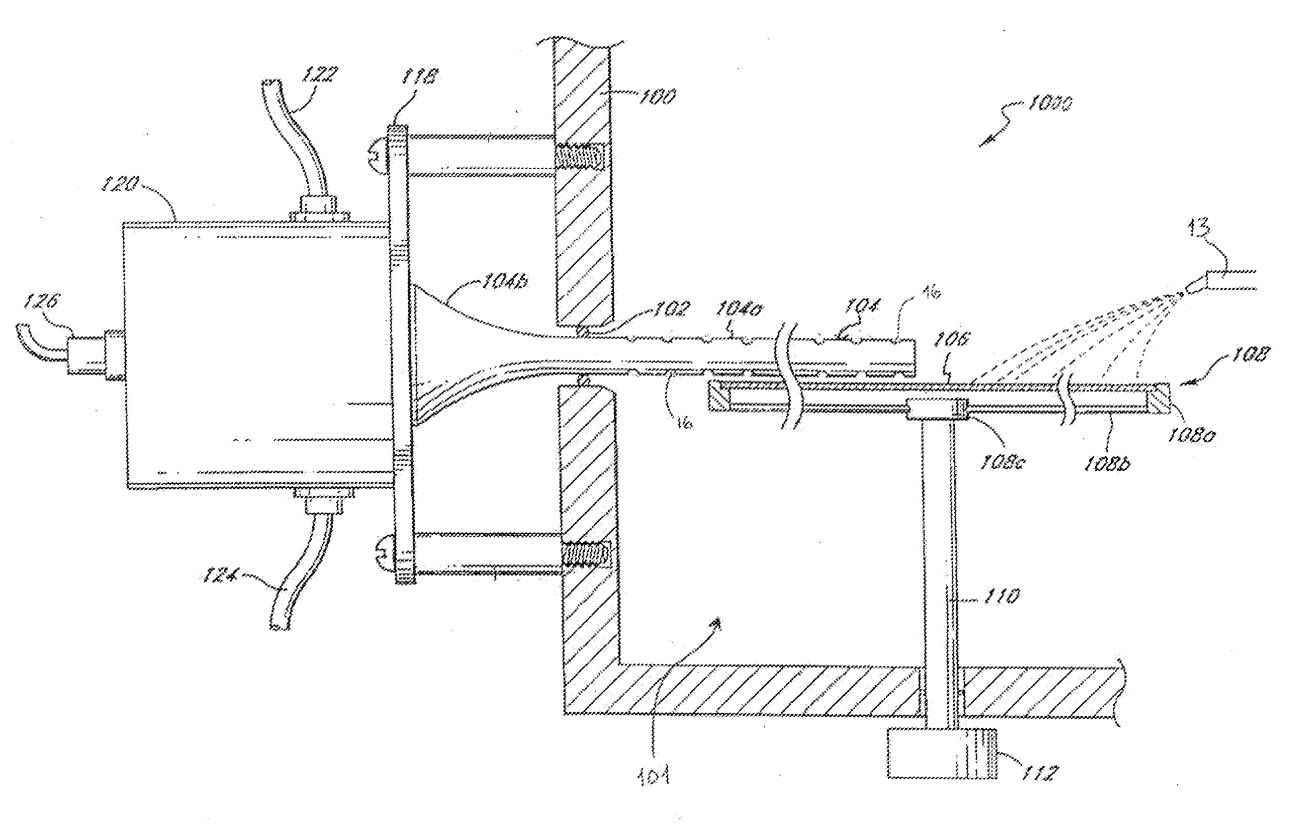 Transducer assembly incorporating a transmitter having through holes, and method and system for cleaning a substrate utilizing the same